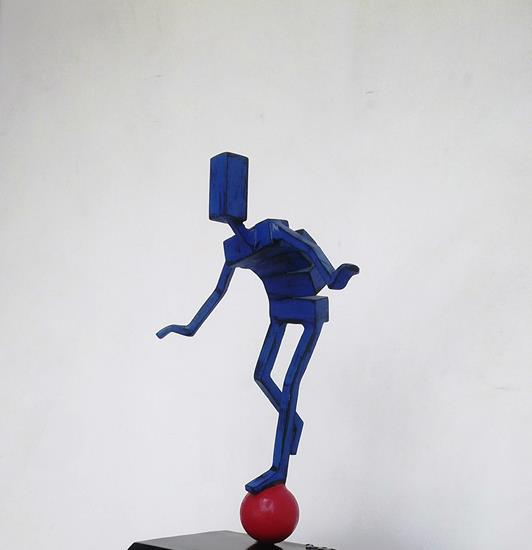 Balancing Act (mini-rolling blue man)